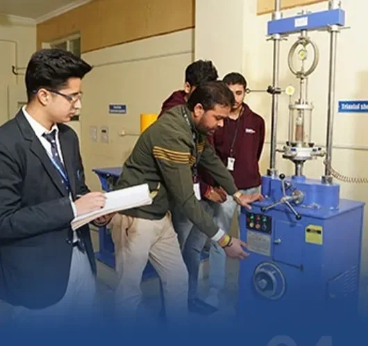 Students in a CGC University engineering laboratory