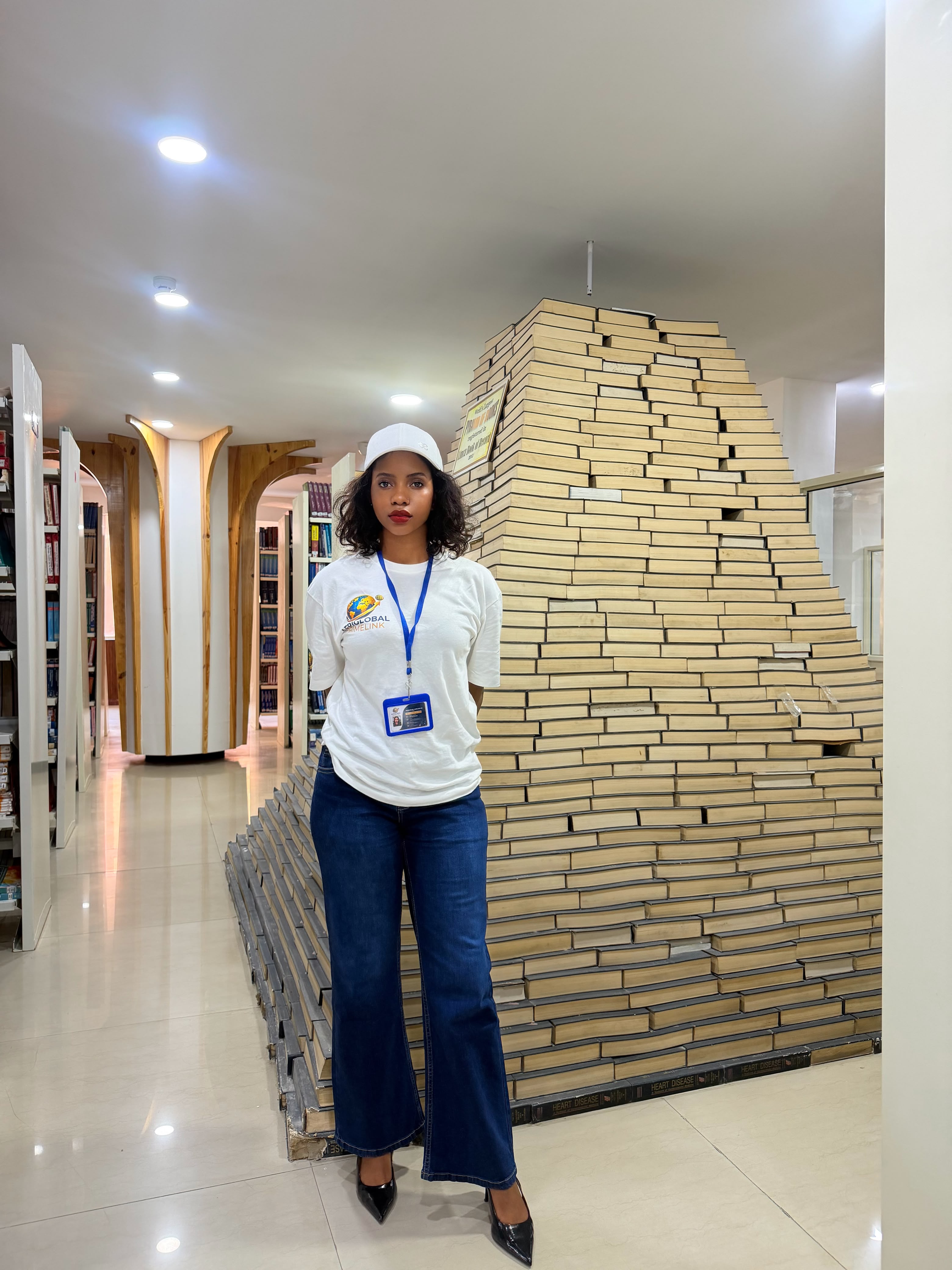An AfriGlobal representative in the MM University library atrium