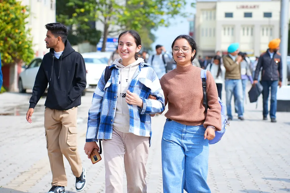 Students by the library at Rayat Bahra University