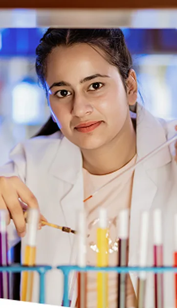 A student in a science laboratory at SGC