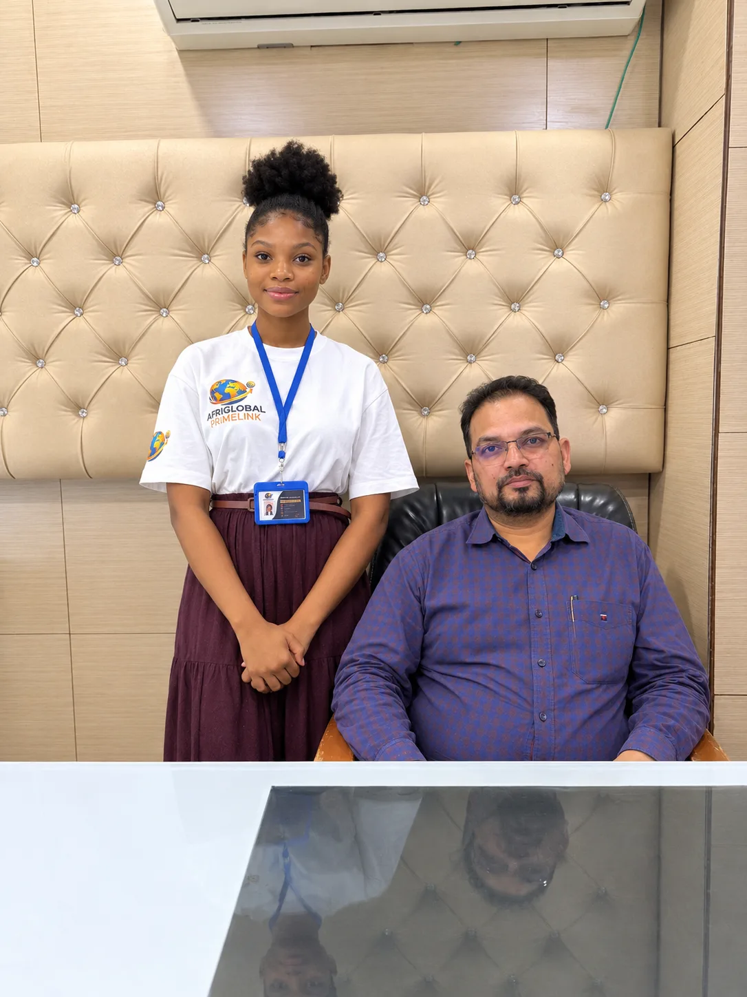 An AfriGlobal representative with the lead instructor at the Trading Avenue office in Mohali